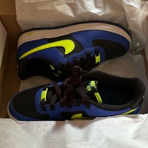 Size 7 1/2 men’s airforce 1 Nike shoes. Great condition. Blue,black,&neon green